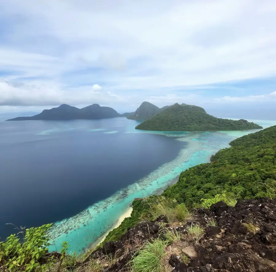 High angle drone view of the overwater resort layout Pearl Island Resort